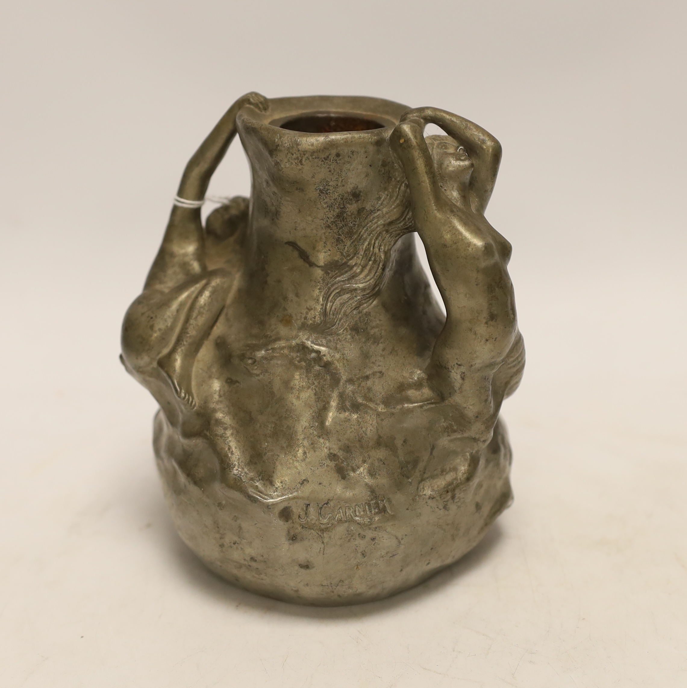 An Art Nouveau pewter 'psirens' vase, signed J. Garnier , 16cm high